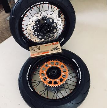SMPro supermoto wielen KTM EXC zwarte spaken met oranje nippels